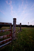 Fencepost At Dusk